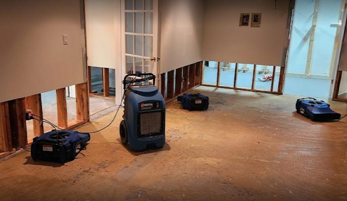 a room undergoing water damage restoration