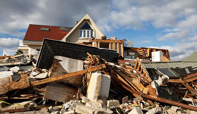 A house severely damaged by a natural disaster